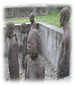 A group of young men standing next to a fence

Description automatically generated